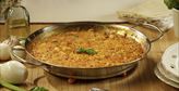 Imagen de Paella de arroz con pollo y tomate