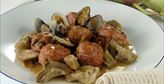 Imagen de Albóndigas con alcachofas y almejas